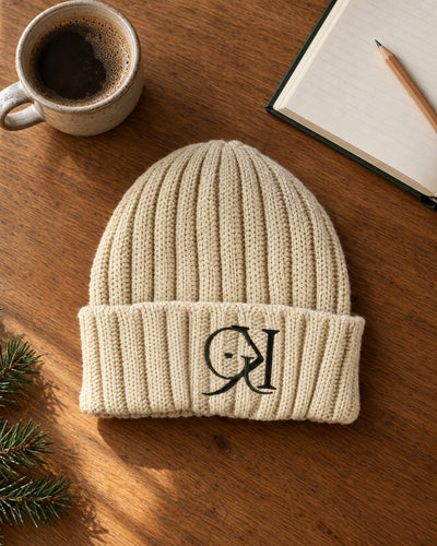 Beige GK beanie flat lay