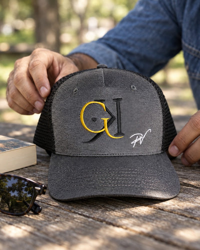 Close-up of the GK logo on the trucker cap
