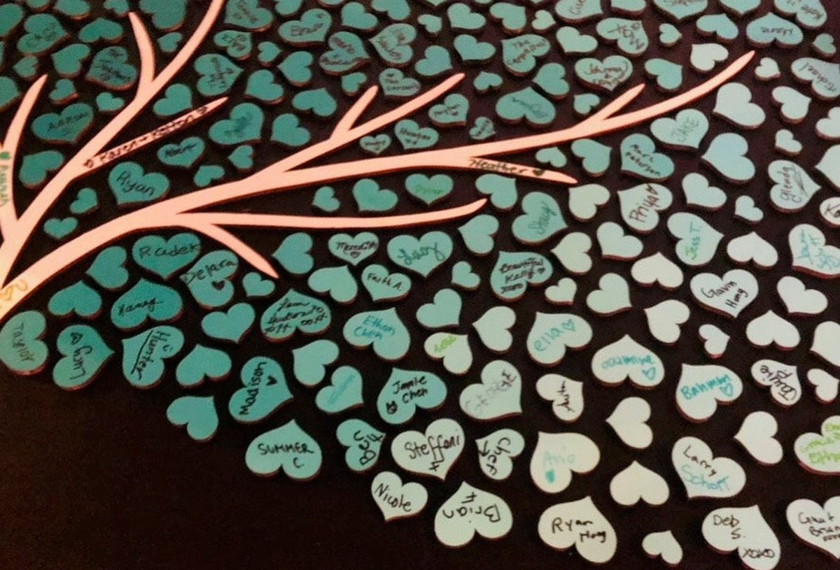 Wooden guest-book tree from my 40th birthday, covered in hearts signed by family and friends