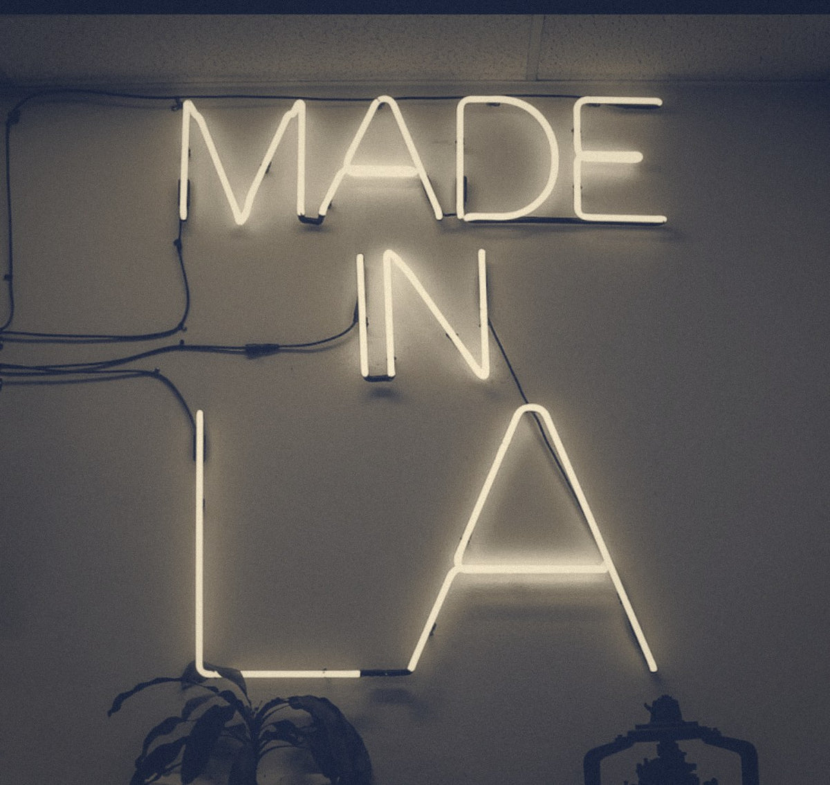 A neon sign that reads Made in LA